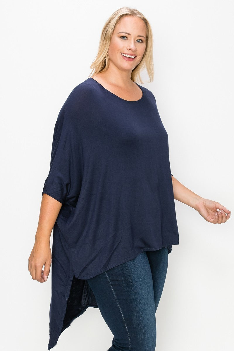 Solid top featuring a round neck, three quarter sleeves, and a high-low hem